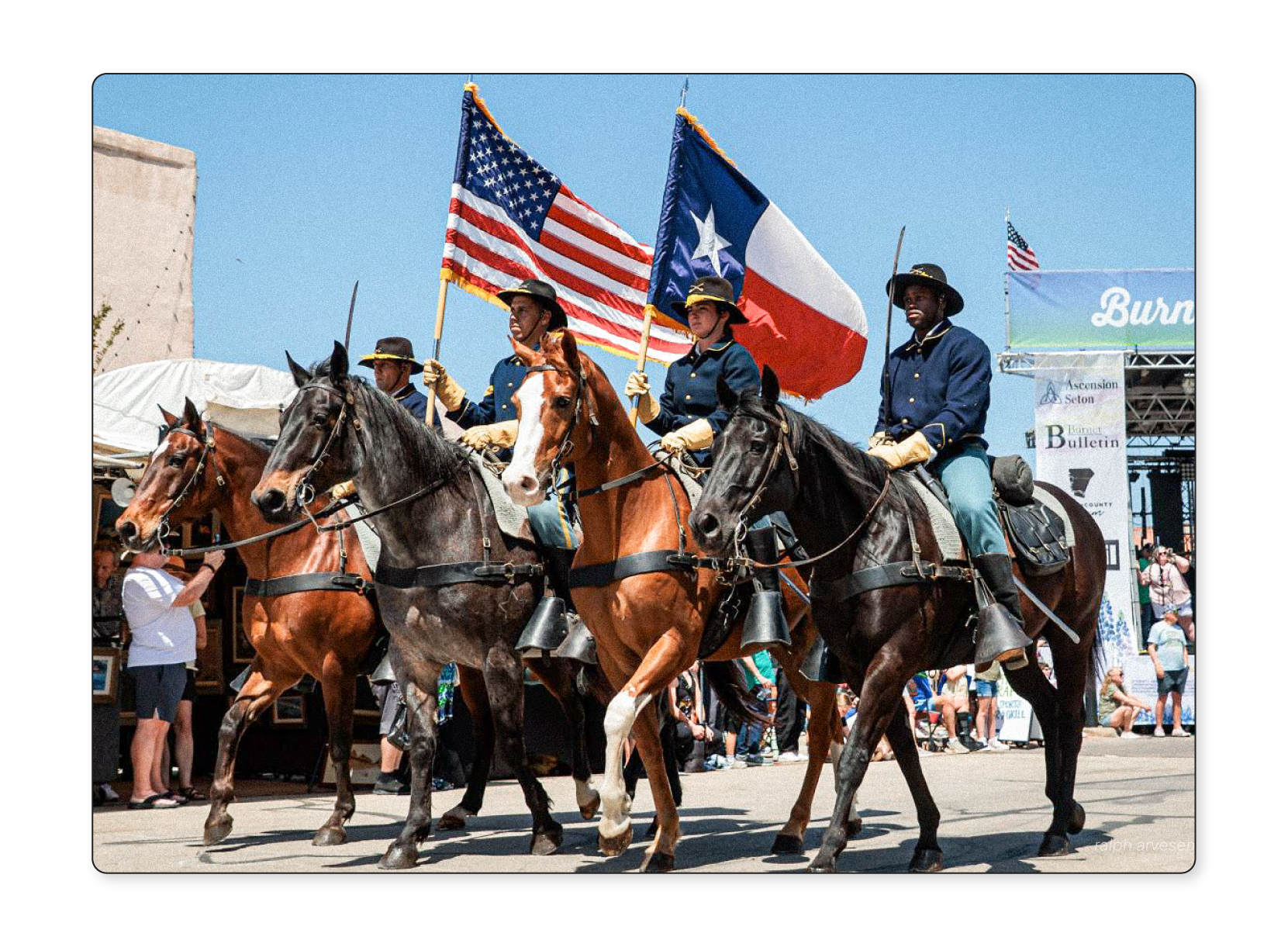 Men on horses at the Burnet Bluebonnet Festival