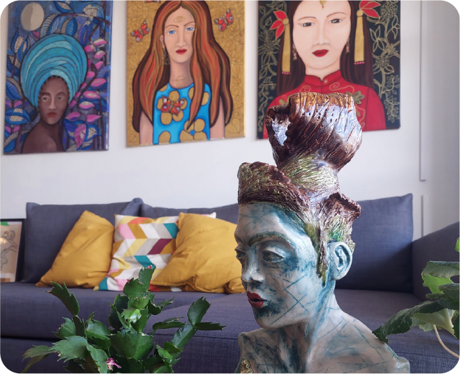 Sculpture with paintings in a living room